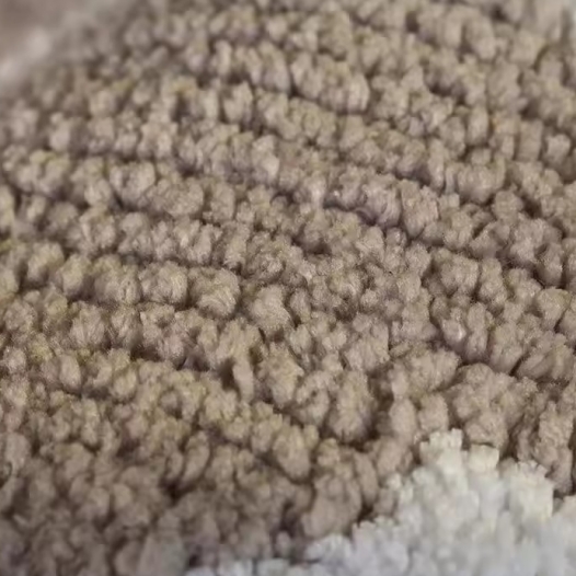 Surface du tapis moelleux