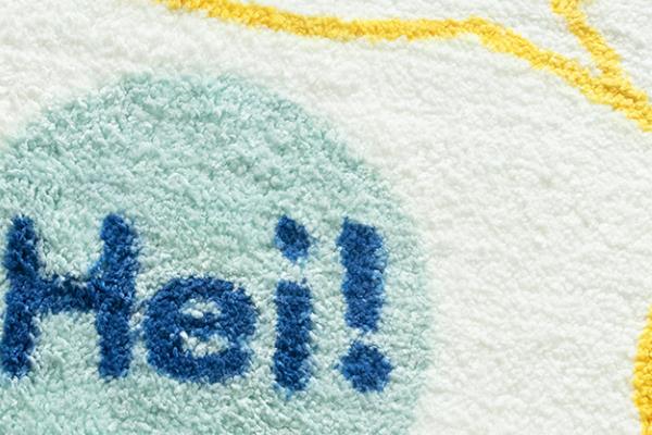 Gros plan de la surface du coussin de bain en peluche