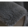 Tapis de peluche à la maison douce et confortable